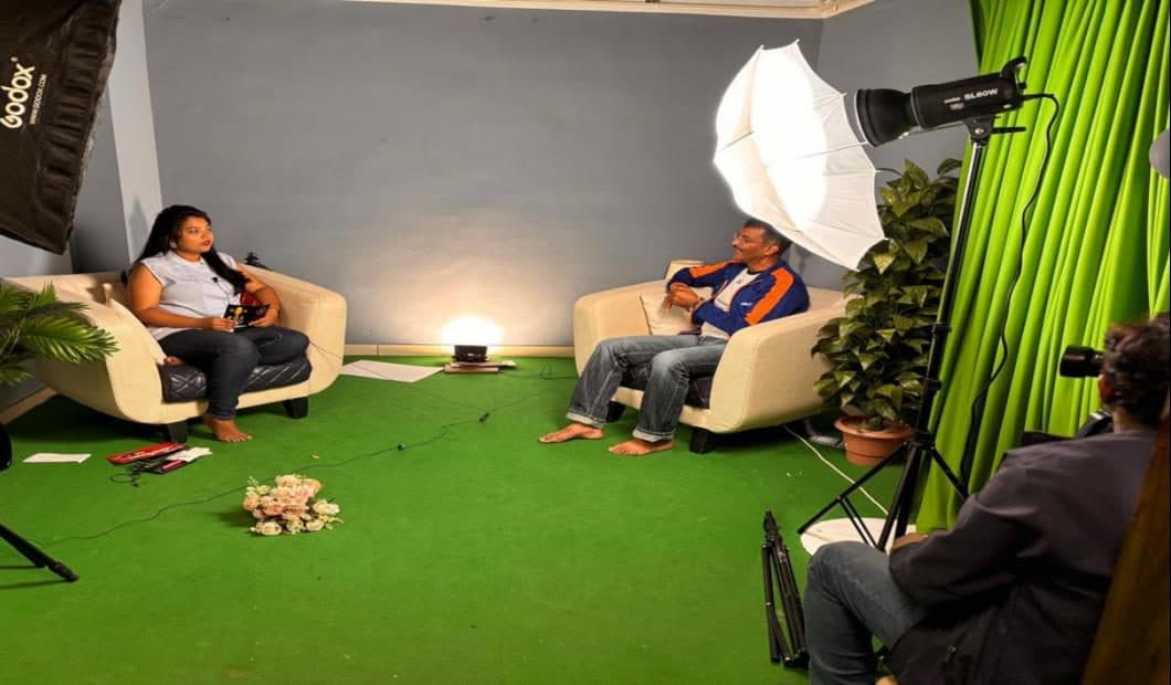 Lit green-screen chroma floor at the studio